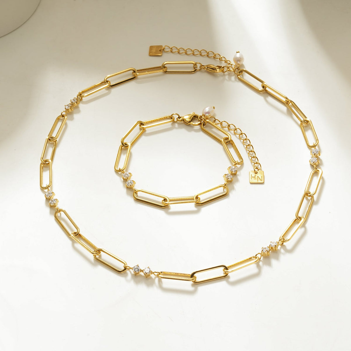 HACKNEY NINE ELOPPINA gold paper clip chain with zirconia accents and freshwater pearl charm, alternate view