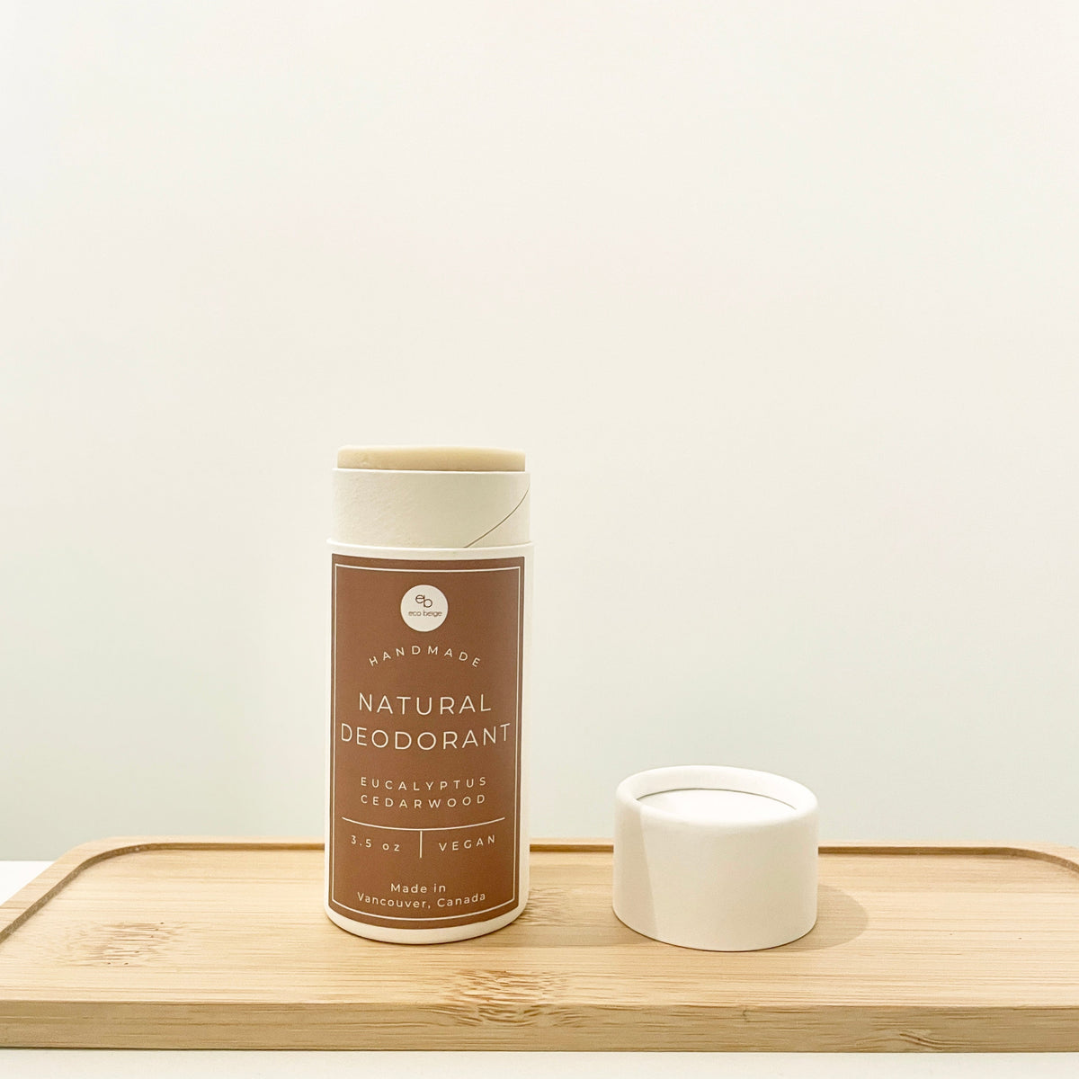 Eco Beige eucalyptus cedarwood natural deodorant in a paper tube, alternate view