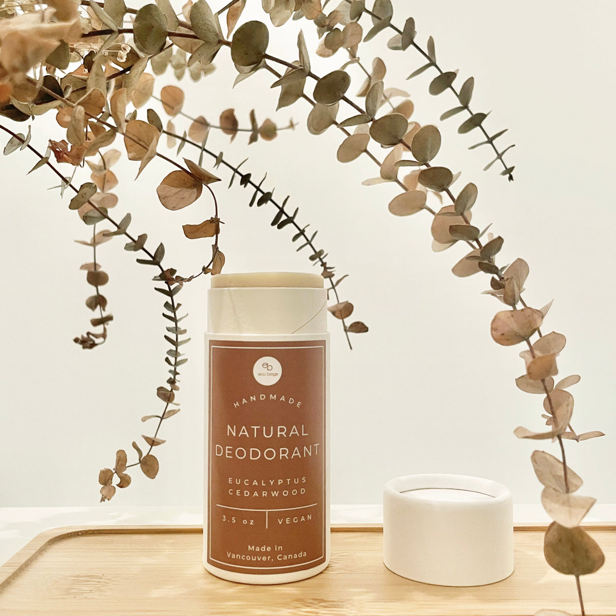 Eco Beige eucalyptus cedarwood natural deodorant in a paper tube, alternate view