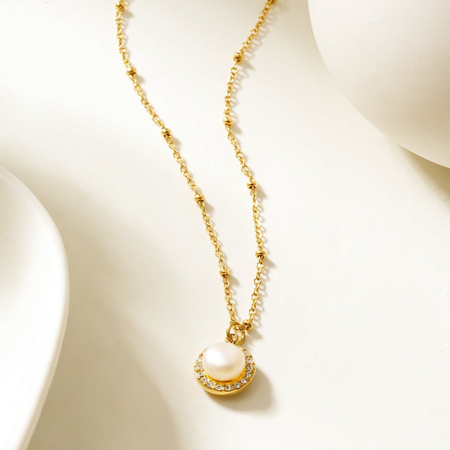 LATAHIA Gold: Beaded Chain necklace with Freshwater Pearl & Pavé Zirconia Border Pendant